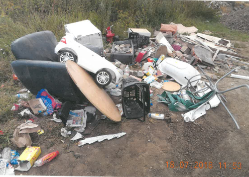 Fly tipping at Setchel Drove site