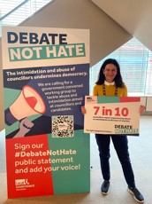 Cllr Bridget Smith standing for the 'Debate not hate' message